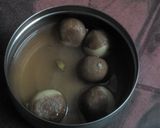 A picture of step 23 of Two In One brown semolina rasgulla.