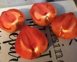 Une image de l'étape 2 de Tomates aux herbes,ail et parmesan.