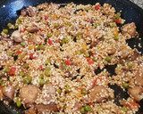 Foto del paso 2 de la receta: Arroz negro con calamar y rape