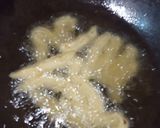 A picture of step 10 of Savory crispy potato churros.
