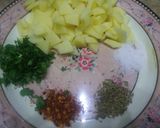A picture of step 1 of Aloo ki tarkari puri Kay sath.