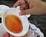 A picture of step 3 of Chicken lollipop.