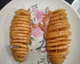 A picture of step 6 of Tornado Potatoes.
