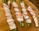 A picture of step 3 of Bbq bacon wrapped asparagus.