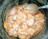 A picture of step 1 of Red Chilli Capsicum Rice.