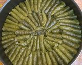 A picture of step 5 of Stuffed Grape Leaves with Vegetables (also known as Yabraq, Yalanji, or Dolma, names vary by country).