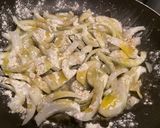 A picture of step 4 of Mdardara - brown lentils and rice with fried onions.