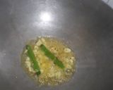 A picture of step 2 of Sarso saag with makke ki roti.