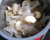 A picture of step 2 of Shahi paneer with white gravy.