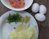 A picture of step 1 of Poached Eggs with spicy Tomatoes and Potato.