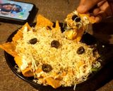 A picture of step 3 of Nachos with cheese sauce.