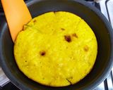 A picture of step 14 of Kabocha Squash Cake in a Frying Pan.