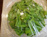 A picture of step 1 of Creamy Soy-Goma Garlic Chives Salad.