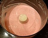 A picture of step 2 of Strawberry Cream Popcicles.