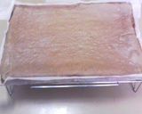 A picture of step 7 of Melt in Your Mouth Chocolate Chiffon Roll Cake.
