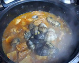 Foto del paso 18 de la receta: Tacos de pechuga de pollo al curry hingú con almejas japonesas