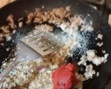 A picture of step 3 of Achari Aloo Baingan.