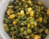 A picture of step 3 of Spinach Corn Ravioli in white sauce.