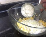 A picture of step 5 of Egg-cheese salad in bread cups.