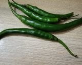 A picture of step 1 of Fried Green Chillies 🌶️🌶️🌶️.