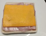 A picture of step 1 of Ham, cheddar and HP brown sauce fried toastie.