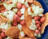 A picture of step 4 of Tostilocos.