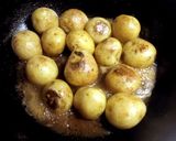 A picture of step 4 of Small New Potatoes Sautéed Teriyaki Style in Sweet and Sour Miso.