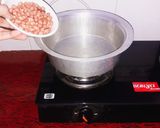 A picture of step 2 of Peanut Burfi/Katli With Jaggery.