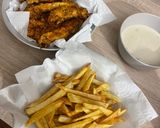 Foto del paso 10 de la receta Tiras de pollo empanadas con salsa de quesos 🍗🫕