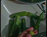 A picture of step 1 of Khatay Masalay ki bhindi.