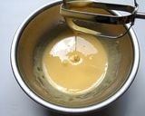 A picture of step 24 of Green Tea and White Chocolate Mousse Cake.