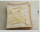 A picture of step 1 of Spinach and Bacon Cheese Toast.