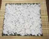 A picture of step 6 of Doll's Festival Seafood Futomaki Sushi Rolls with Nanohana.
