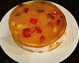 A picture of step 9 of Vanilla Layer Cake with Peppermint Whipped Cream Frosting and Filling.
