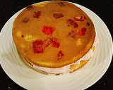 A picture of step 9 of Vanilla Layer Cake with Peppermint Whipped Cream Frosting and Filling.