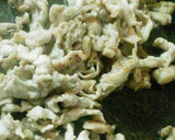 A picture of step 4 of Stir Fried Pork, Shimeji Mushrooms and King Oyster Mushrooms with Oyster Sauce.