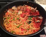 A picture of step 17 of Authentic Vongole Rosso Clam Pasta.