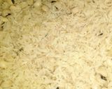 A picture of step 2 of Rice and beans with chicken stew.