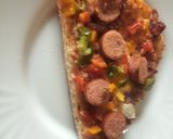 A picture of step 7 of Smokie pizza.