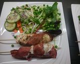 A picture of step 1 of chicken skewers with turkey bacon.