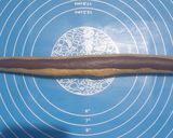 A picture of step 6 of Chocolate Barfi Roll.