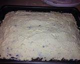 A picture of step 4 of Chocolate Fudge Candy Bar Cake.