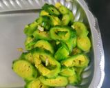 A picture of step 3 of Crispy Karela.