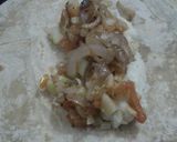 A picture of step 9 of Potato wraps with cucumber relish and caramalised onions.