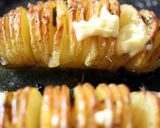 A picture of step 8 of Sig's Humbles ( hasselback potatoes).