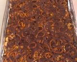 A picture of step 9 of Salty Carmel Peanut & Pretzel Bars.