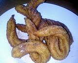 A picture of step 7 of Sig's Churros with chocolate sauce.
