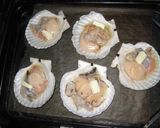 A picture of step 10 of Scallops With Butter and Soy Sauce Baked in Their Shells.
