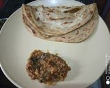 A picture of step 4 of Laccha parantha with bharta.