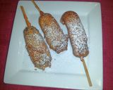 A picture of step 8 of Deep fried snickers bars.